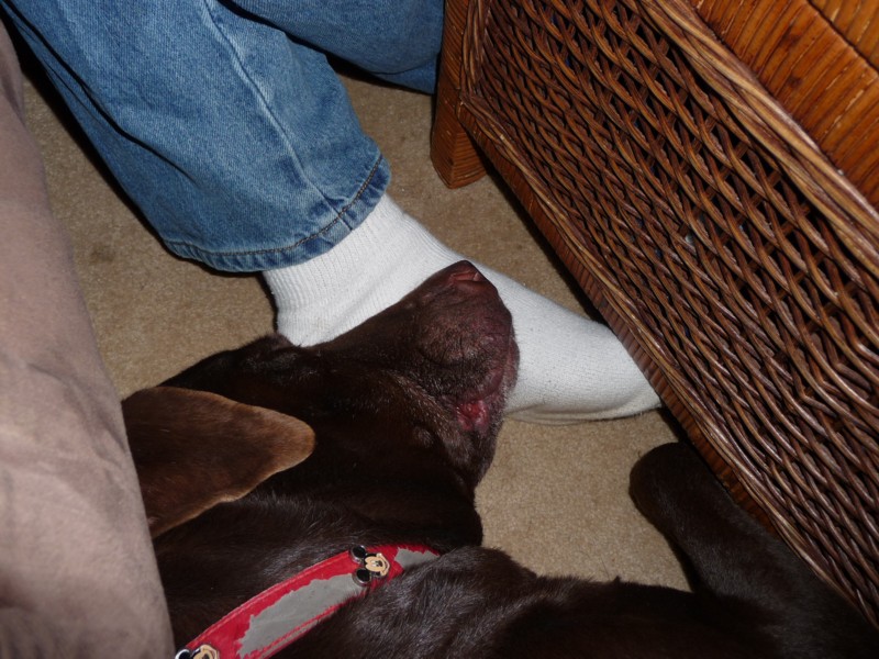 Sleeping on Dad's Foot (1).JPG